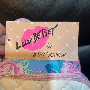 A beautiful backpack, bright colors with front pocket.